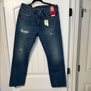 Levi's Straight Jeans in Dark Blue with Light Distressing